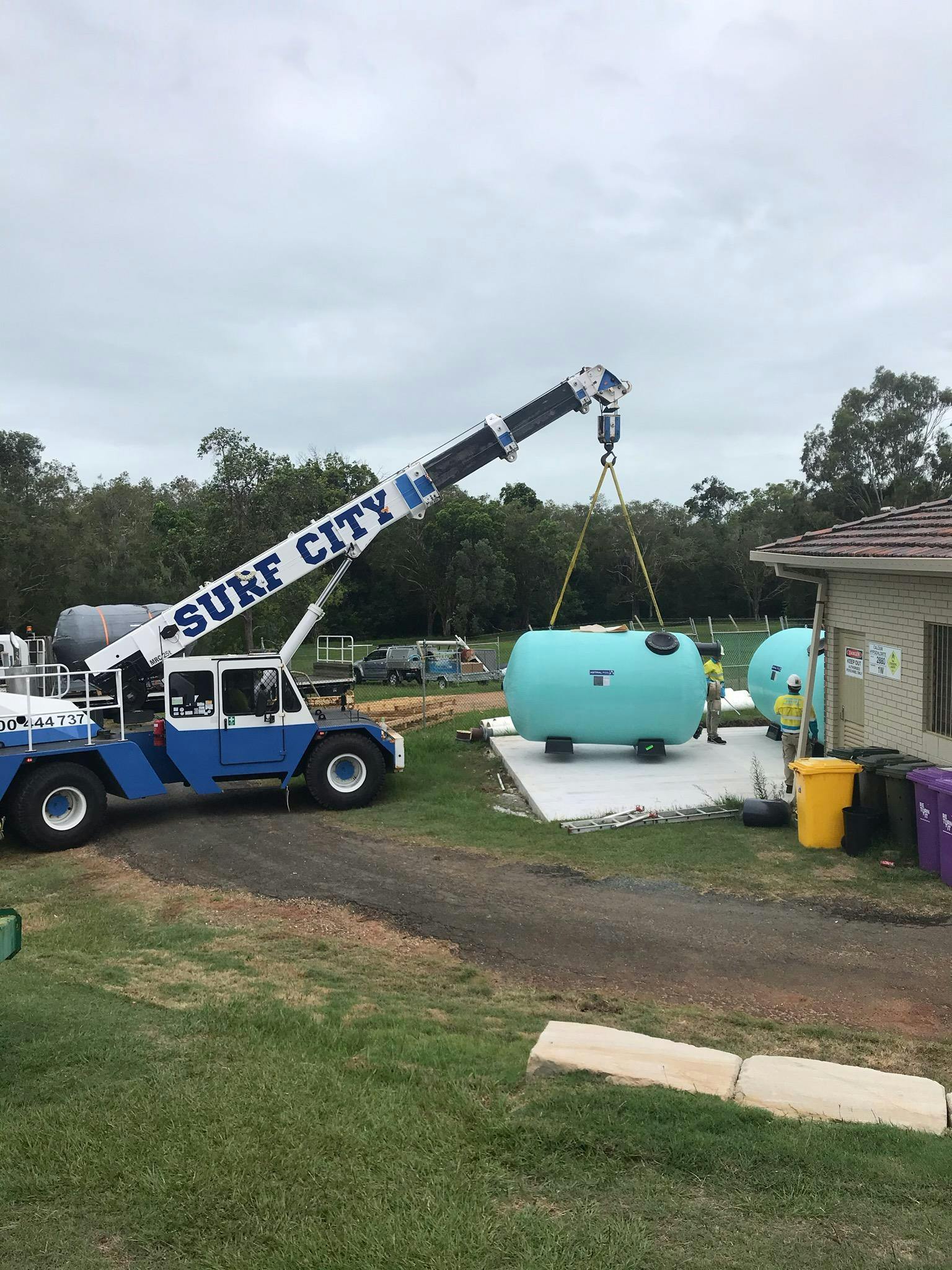 New 50 m pool filter being craned into location.jpg