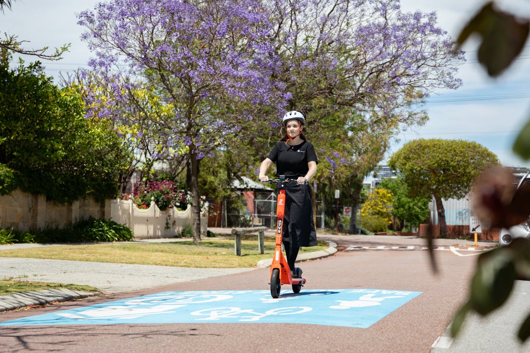 E-scooter rider on a safe active street - Shakespeare Street in Mount Hawthorn