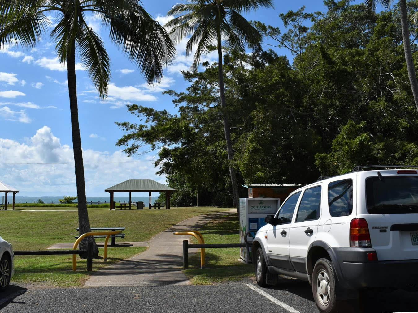 Seaforth Esplanade Road – This photograph is looking north towards the beach. The picnic shelters at the end of the path and the public toilet are located to the right. The top of the swimming enclosure is just visible above the line of the dune.