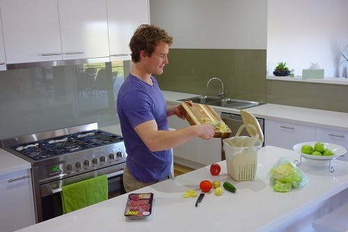 Separating food scraps in the kitchen.