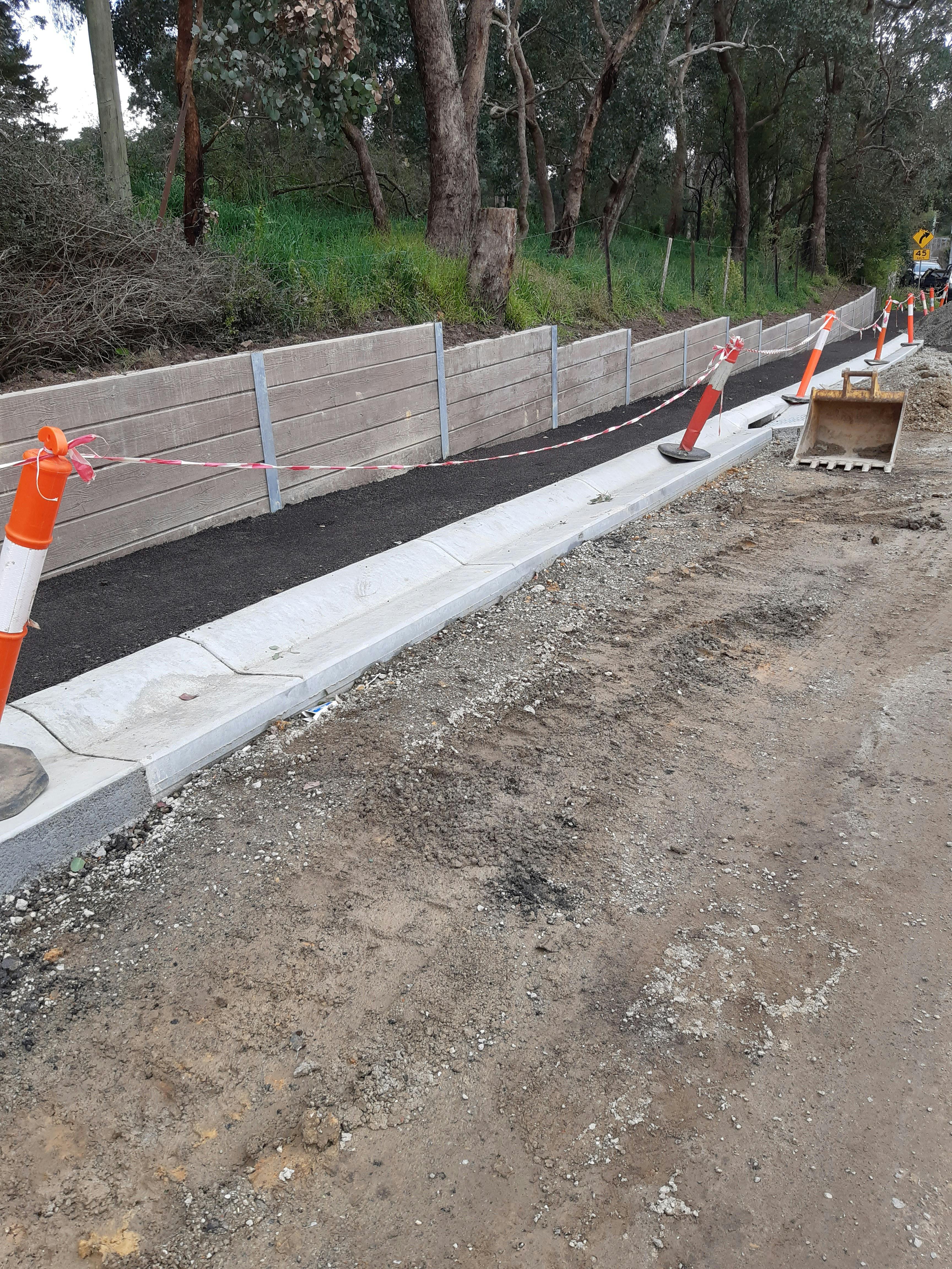 Kerbside and channel works as part of the Jumping Creek road upgrade.jpg