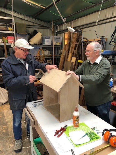 Men's Shed at work on the Street Library houses