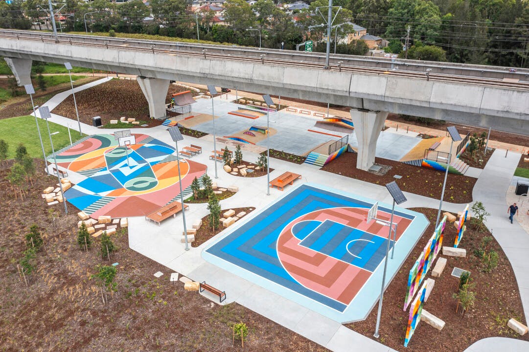 Beaumont Hills Park with multipurpose court featuring colourful linemarking / half basketball court 