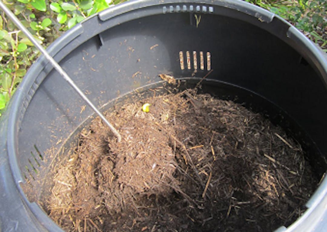 A compost turner will help aerate your compost