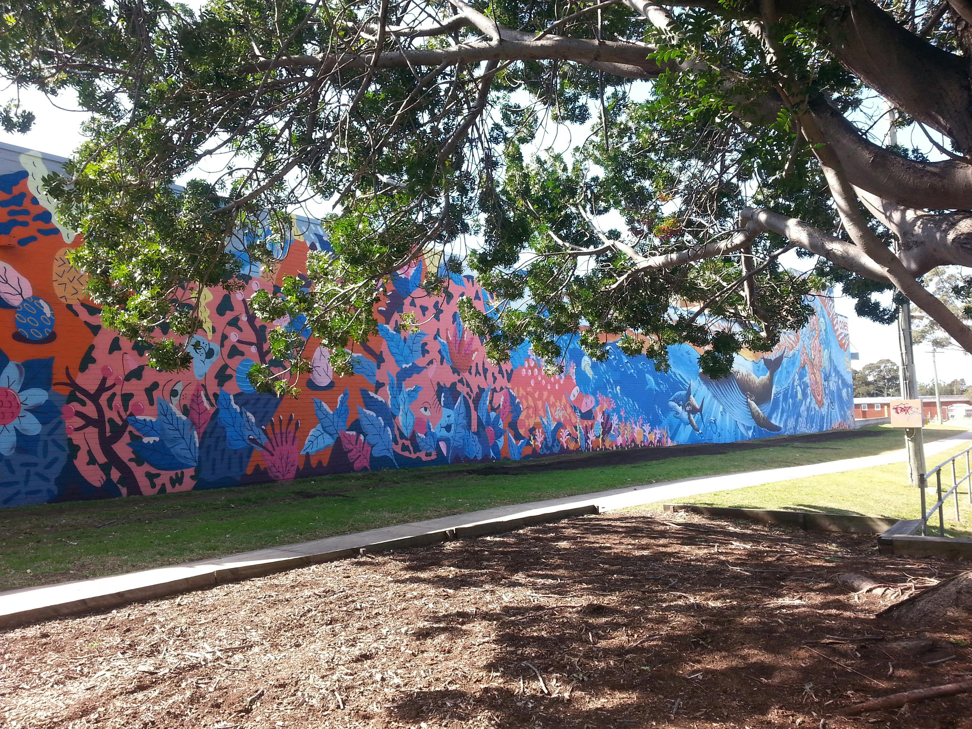 Mural peeking through the trees