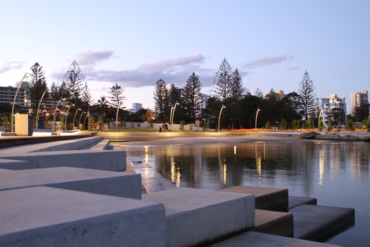 Revitalisation works overlooking calm waters at twilight