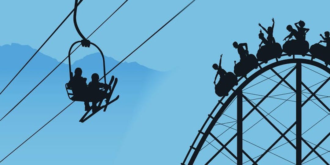 REALLY? Image of ski lift going over a roller coaster
