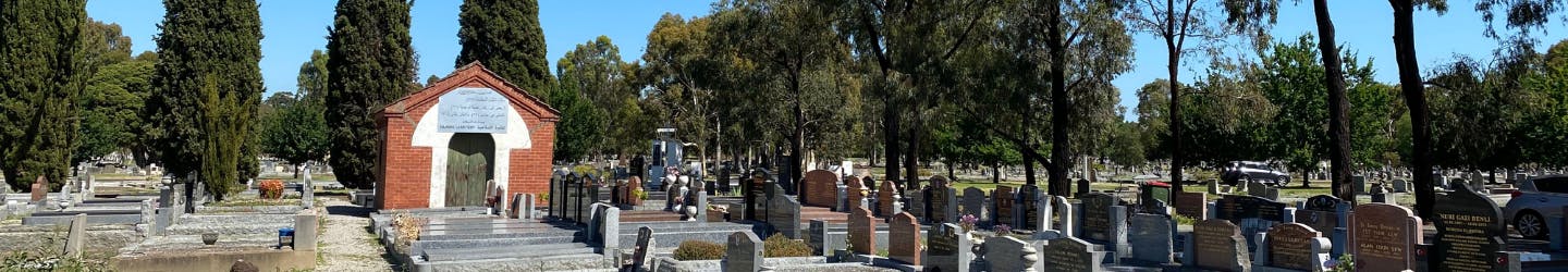 Image of a Islamic mortuary chapel surrounded by headstone at Fawkner Memorial part. 