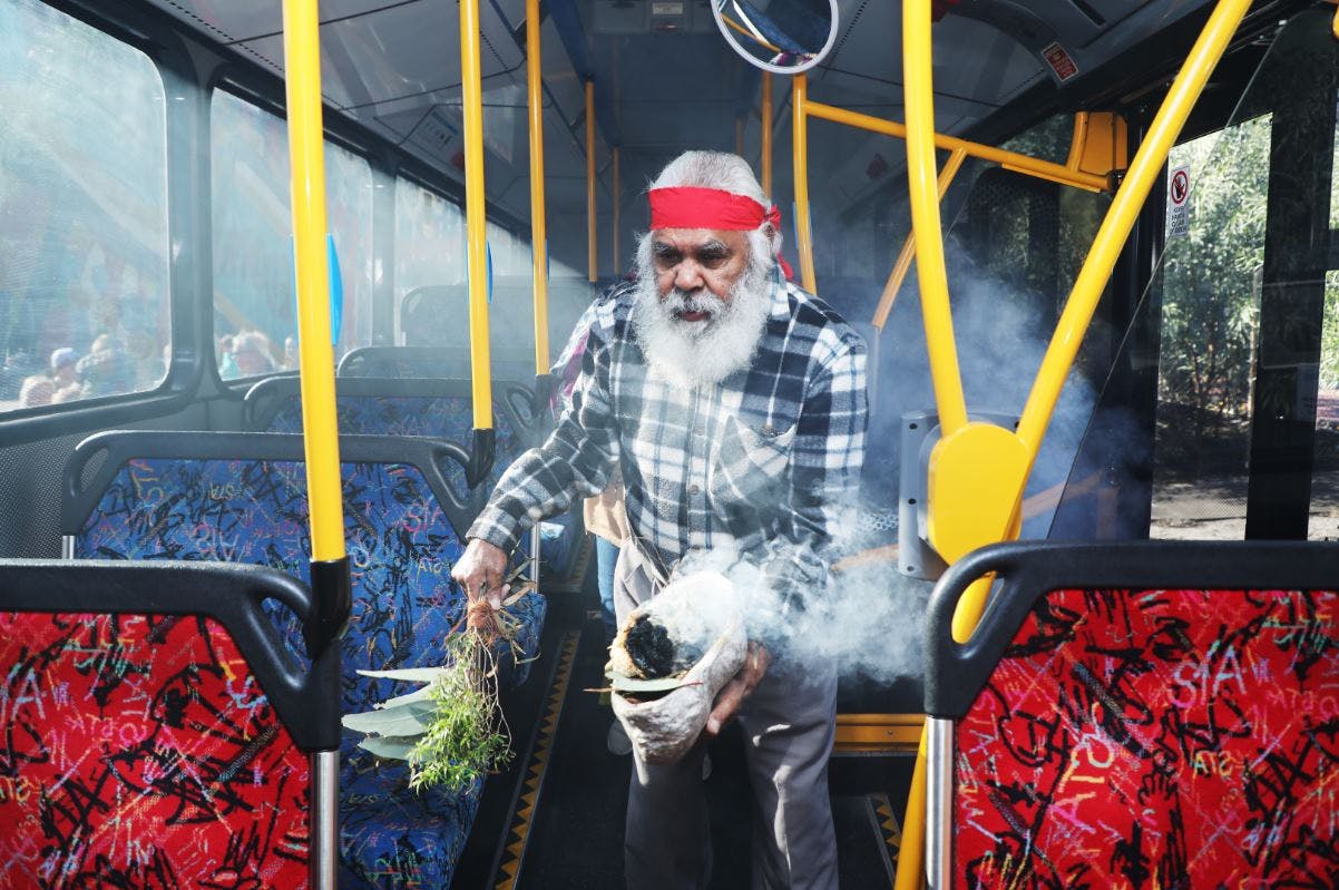 Performing a smoking ceremony inside the STA bus