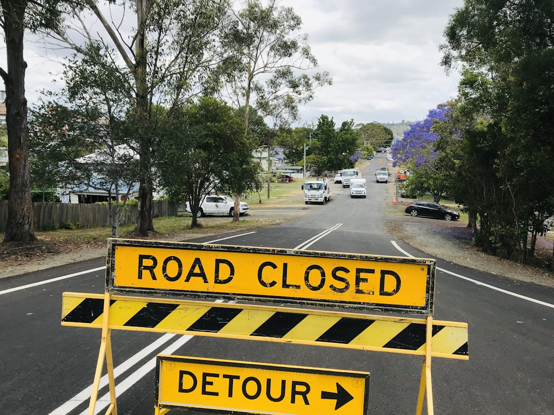 A photo of Diadem Street roadworks with a road closed and detour sign.
