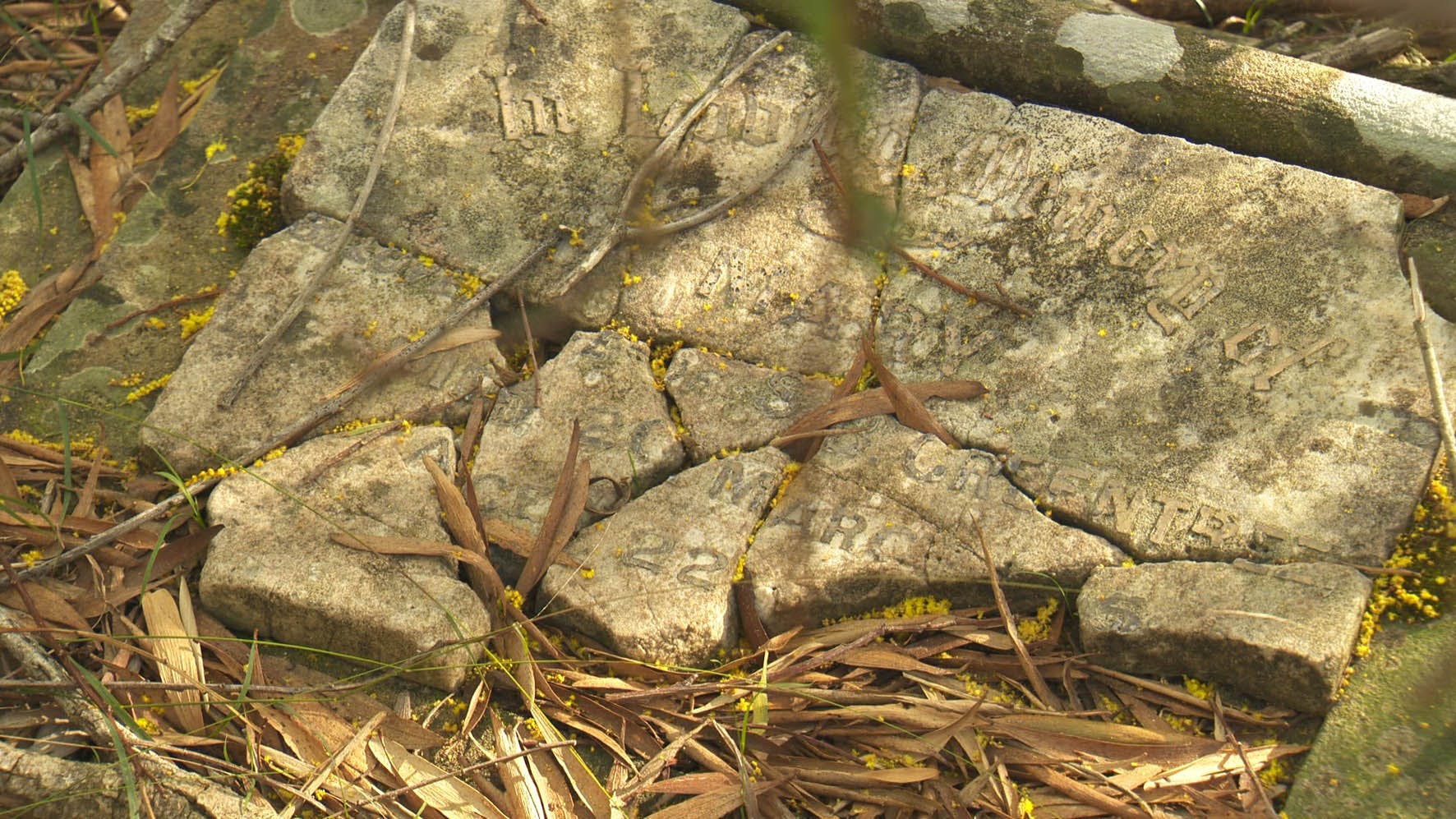 Fragmented headstone