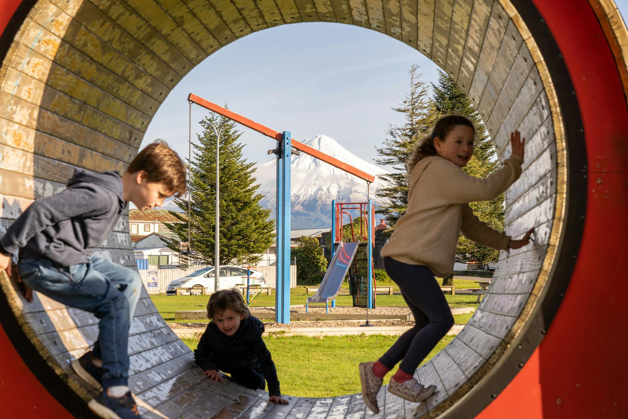 Kids playing in the Children's Playground running wheel