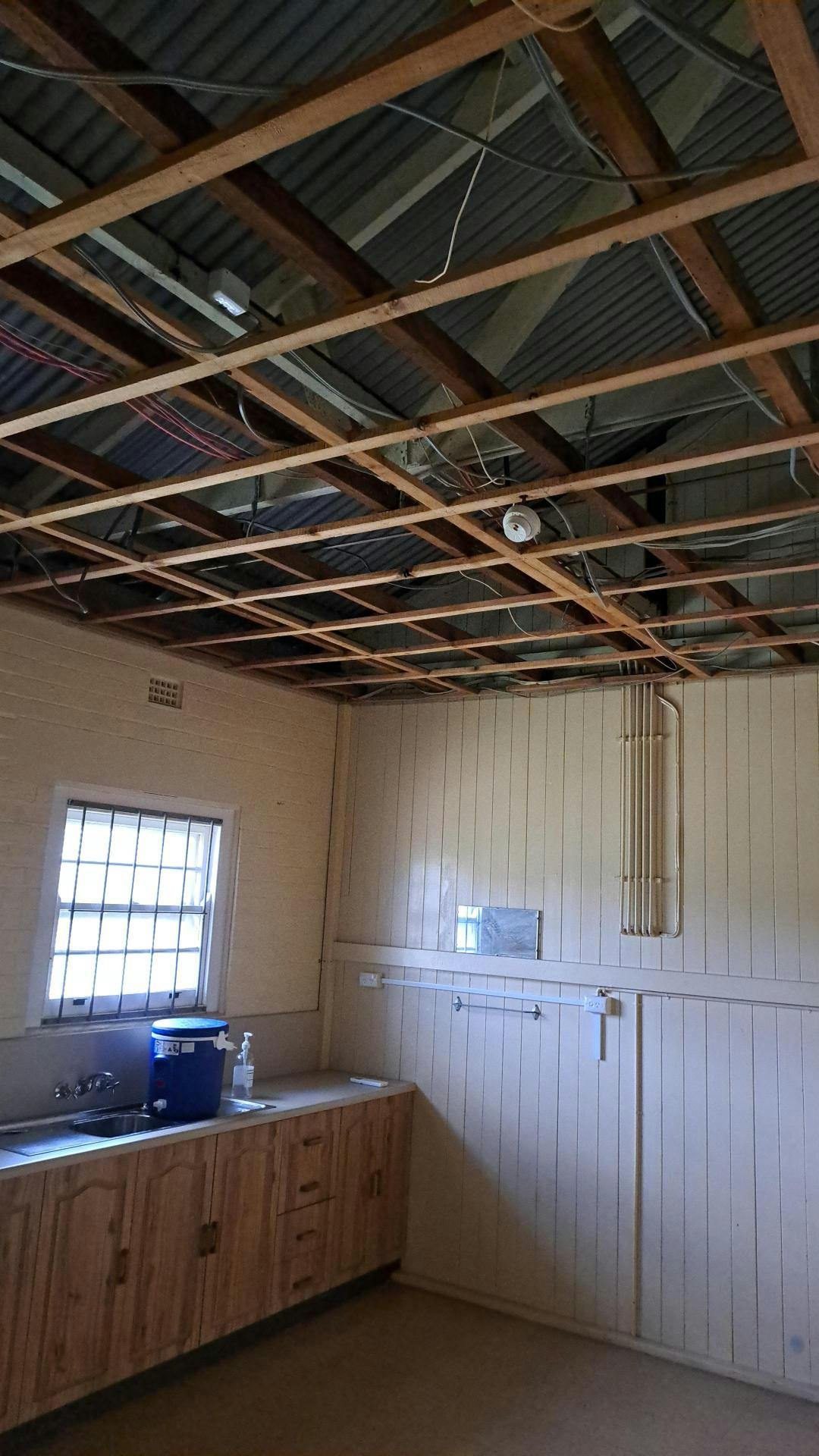 Former WWII Radio Receiving Station minor works - friable asbestos ceiling removed from the kitchen.png