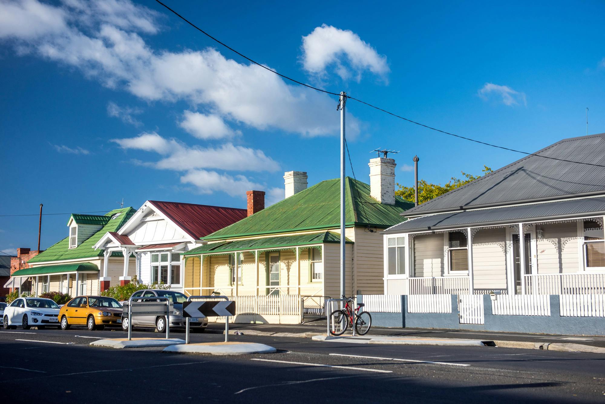 View from the street of a row of weatherboard houses