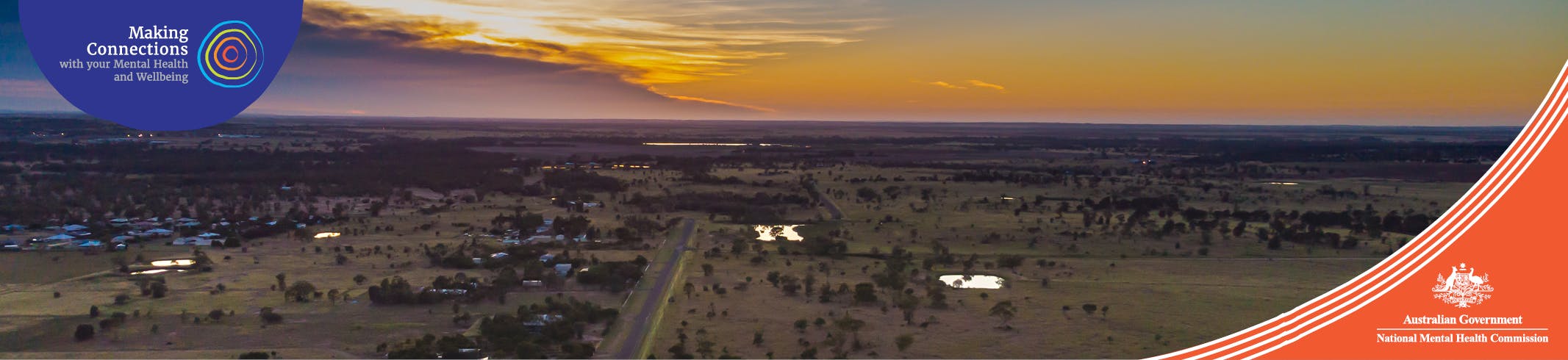 Aerial view during sunrise over the Australian outback near the village of Roma, Queensland, Australia. A drone view
