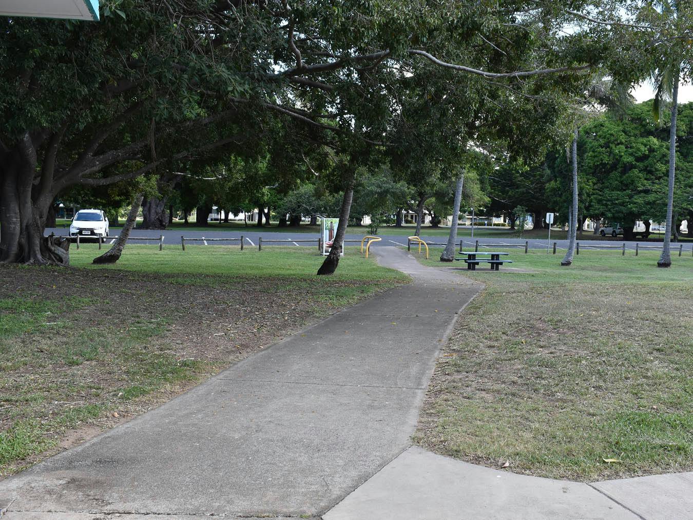 Picnic area – A view of the intersection of the path providing access to shelters and the public toilets from the car park. This view is looking south towards the car parking area along Seaforth Esplanade Road.