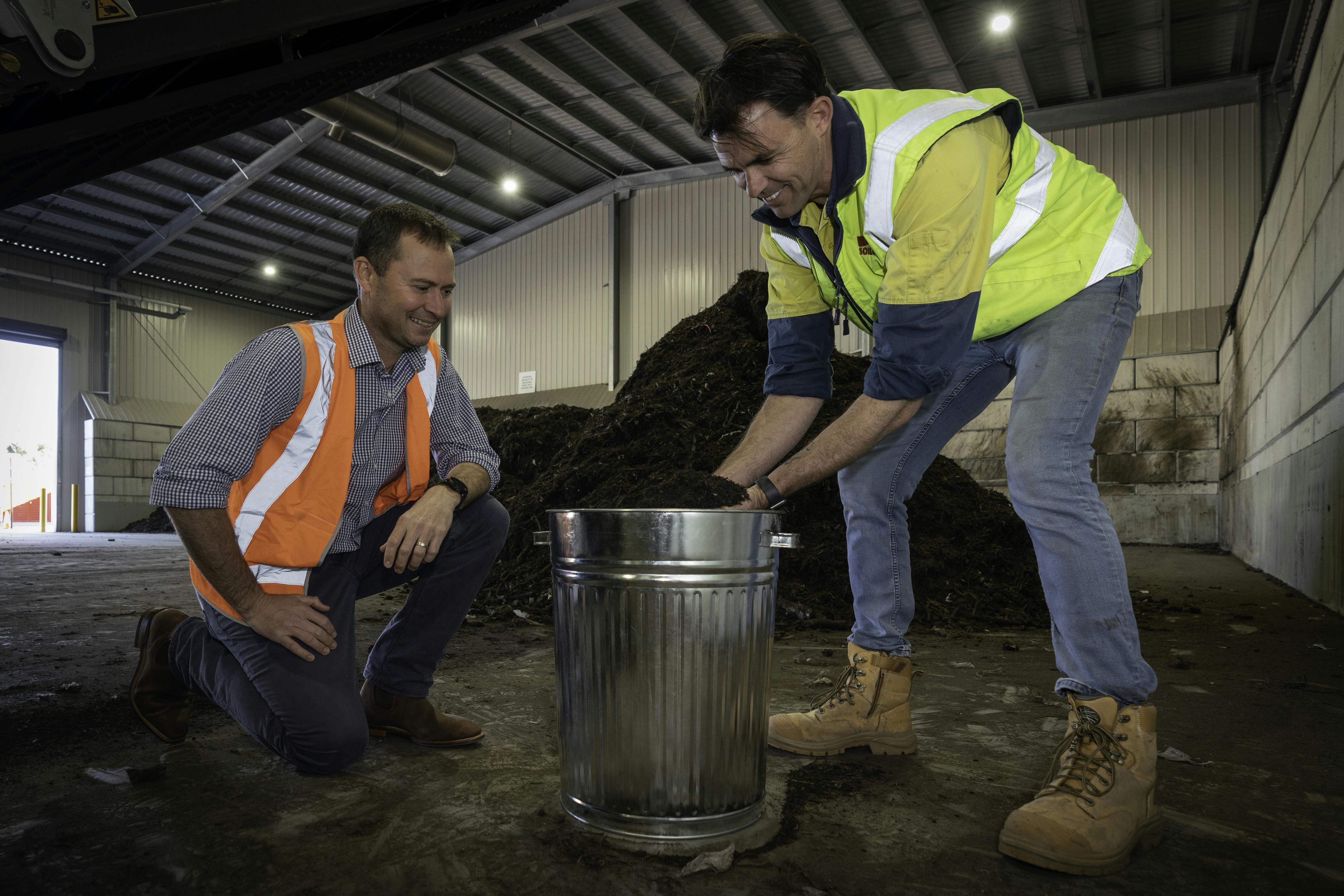 Council's Acting Project & Operations Officer Wes Knight and Soilco Operations Manager Mark Emery inspecting some of the processed compost