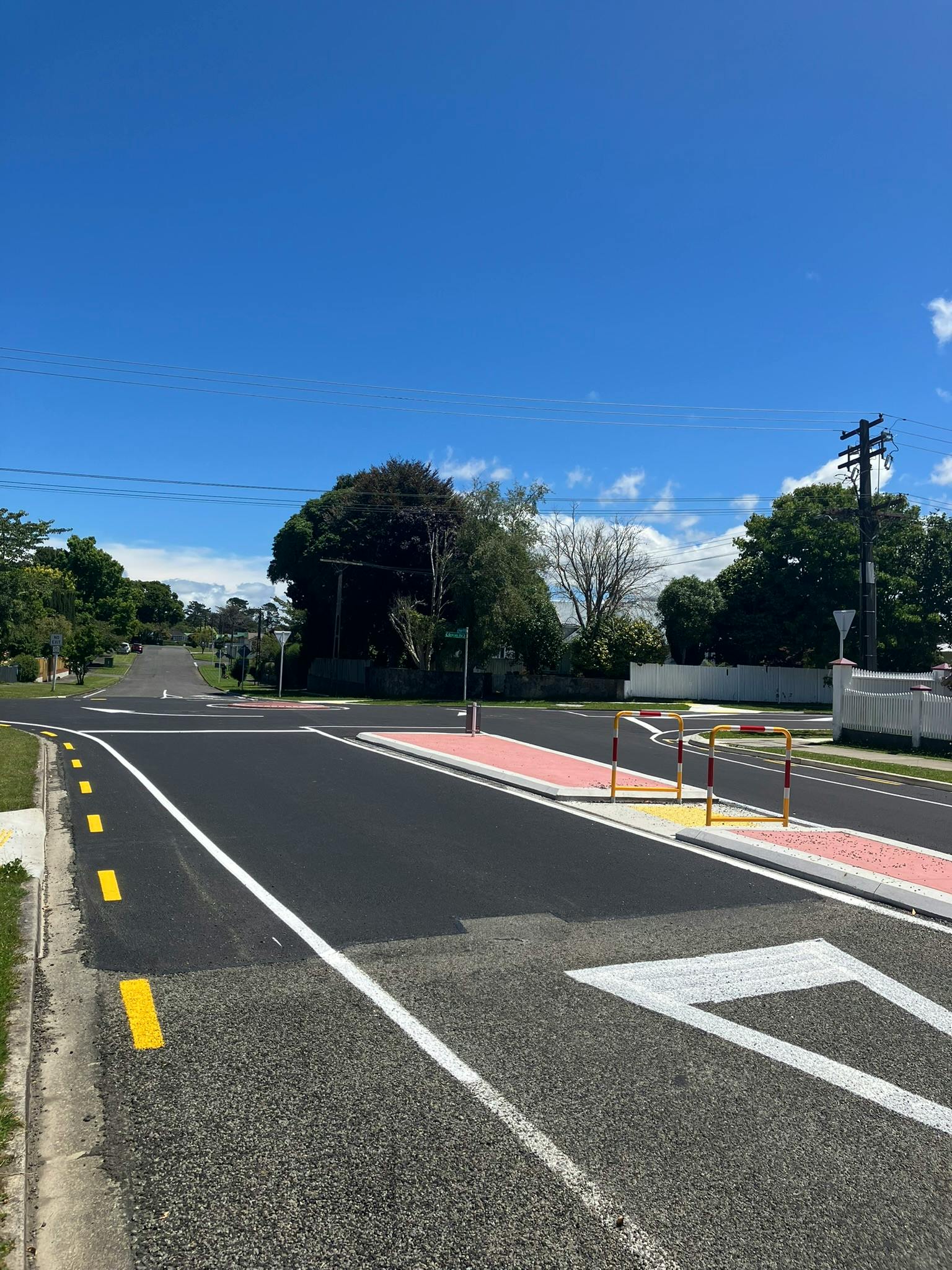 Photo of newly established mini roundabout and raised refuge island at intersection