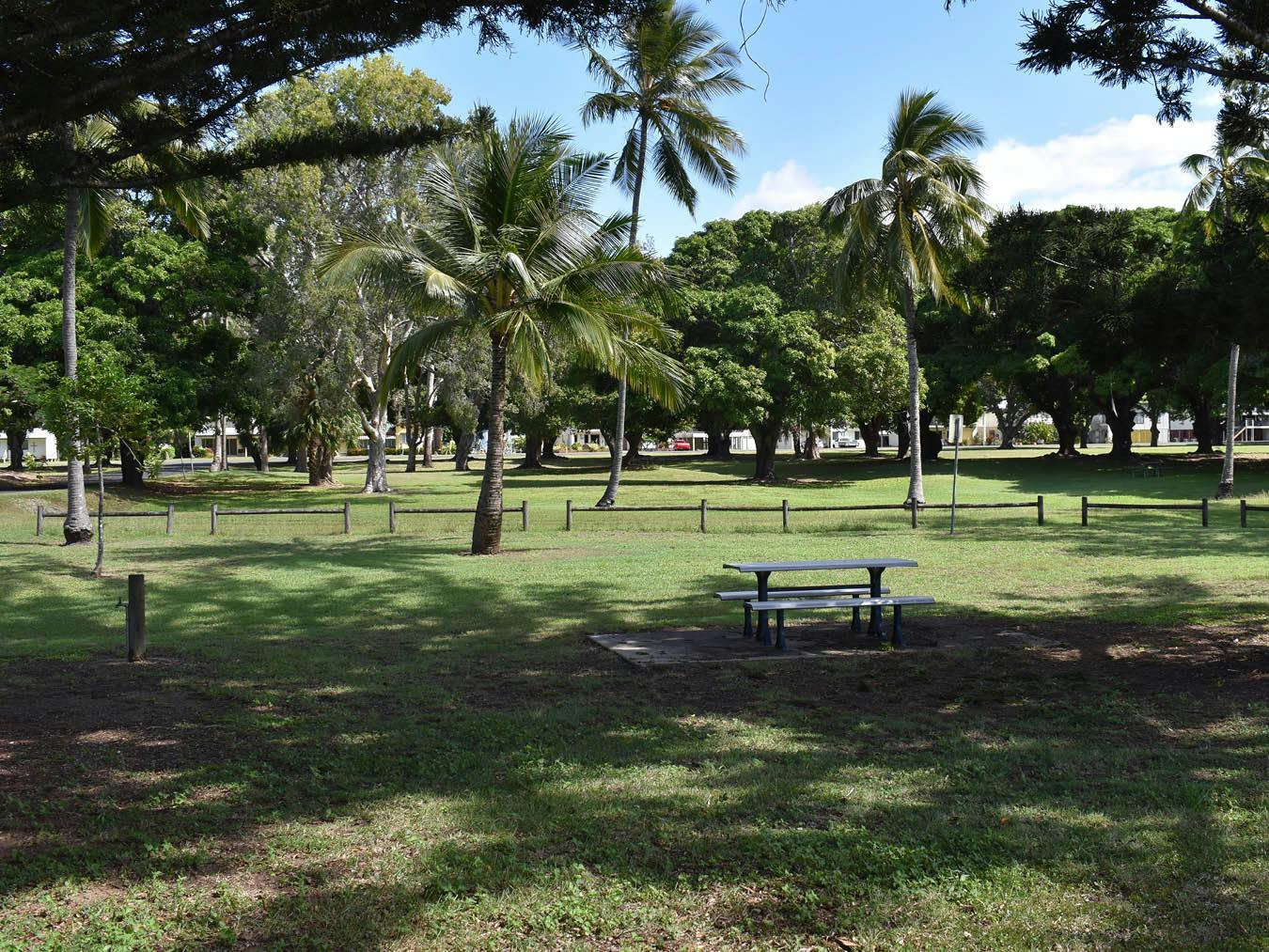 This photograph is looking south across the reserve of a picnic area.