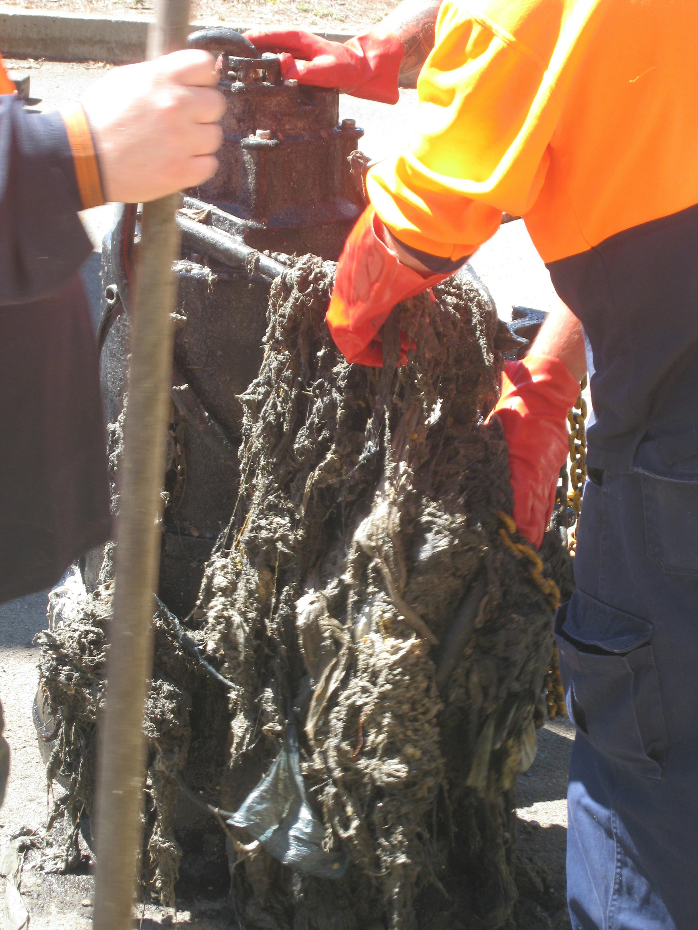 Manually removing wipes from our system
