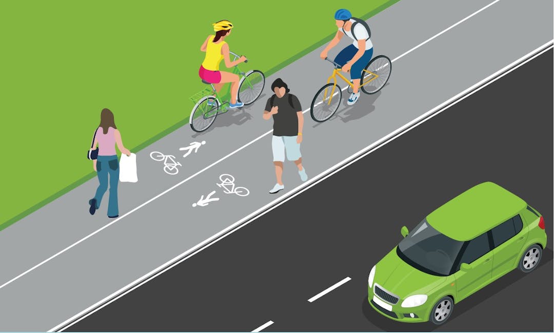 A cartoon image of a shared path, with pedestrians and cyclists walking and riding next to traffic.