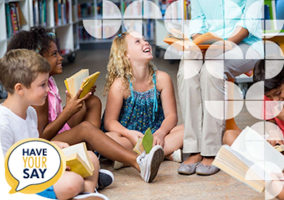 Decorative Person reading to children in a library