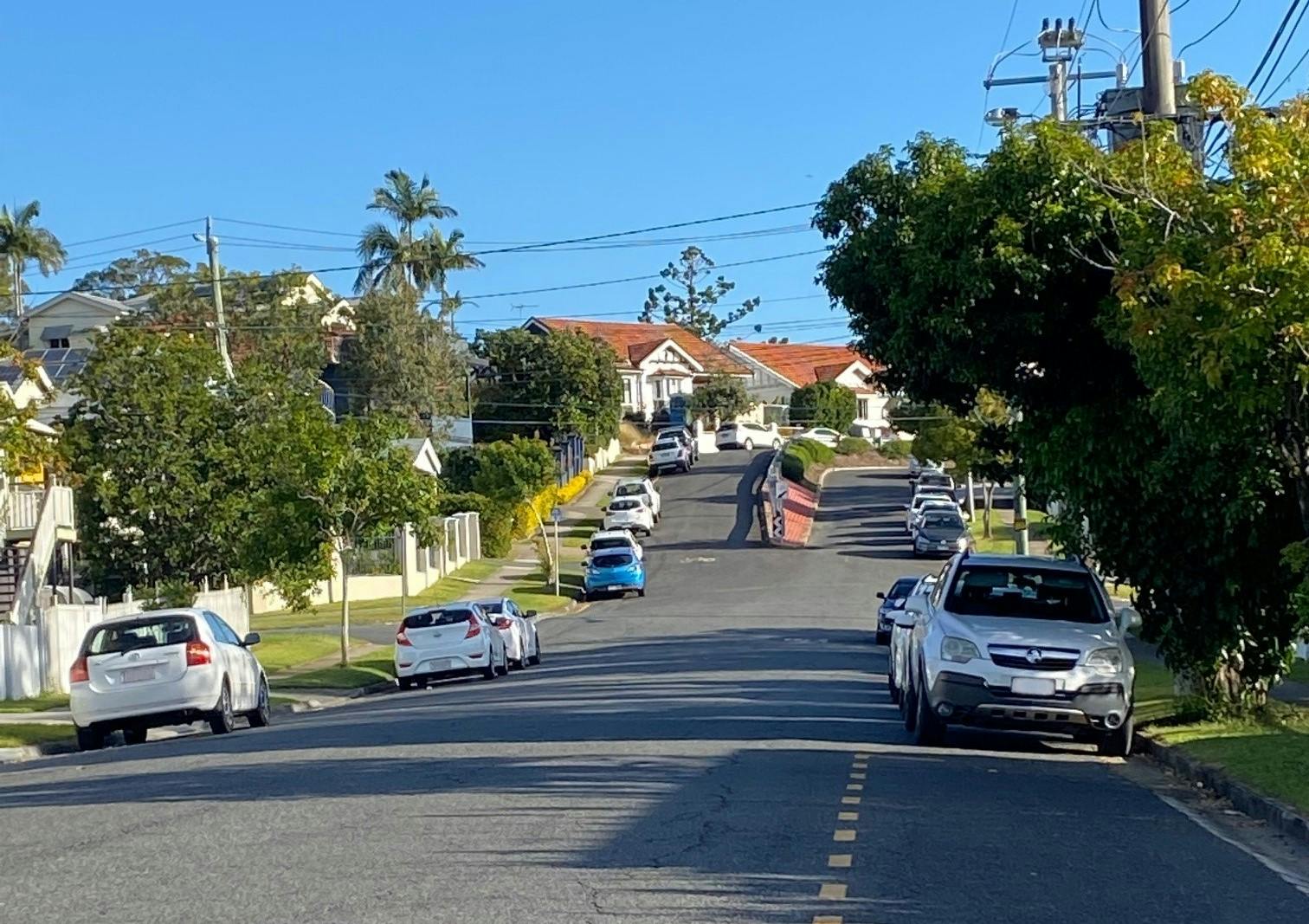 Photo of cars parked along both sides of Nicholson Street, Greenslopes