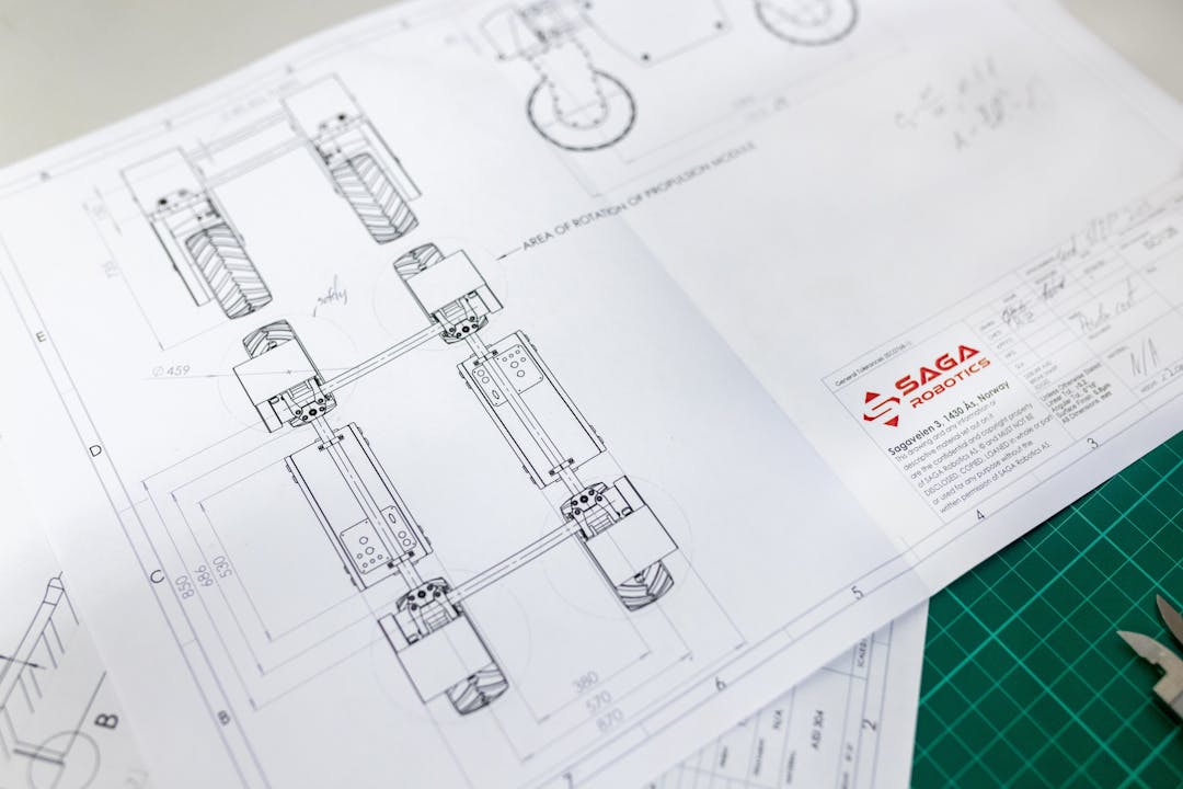 Engineering plan spread out on a table