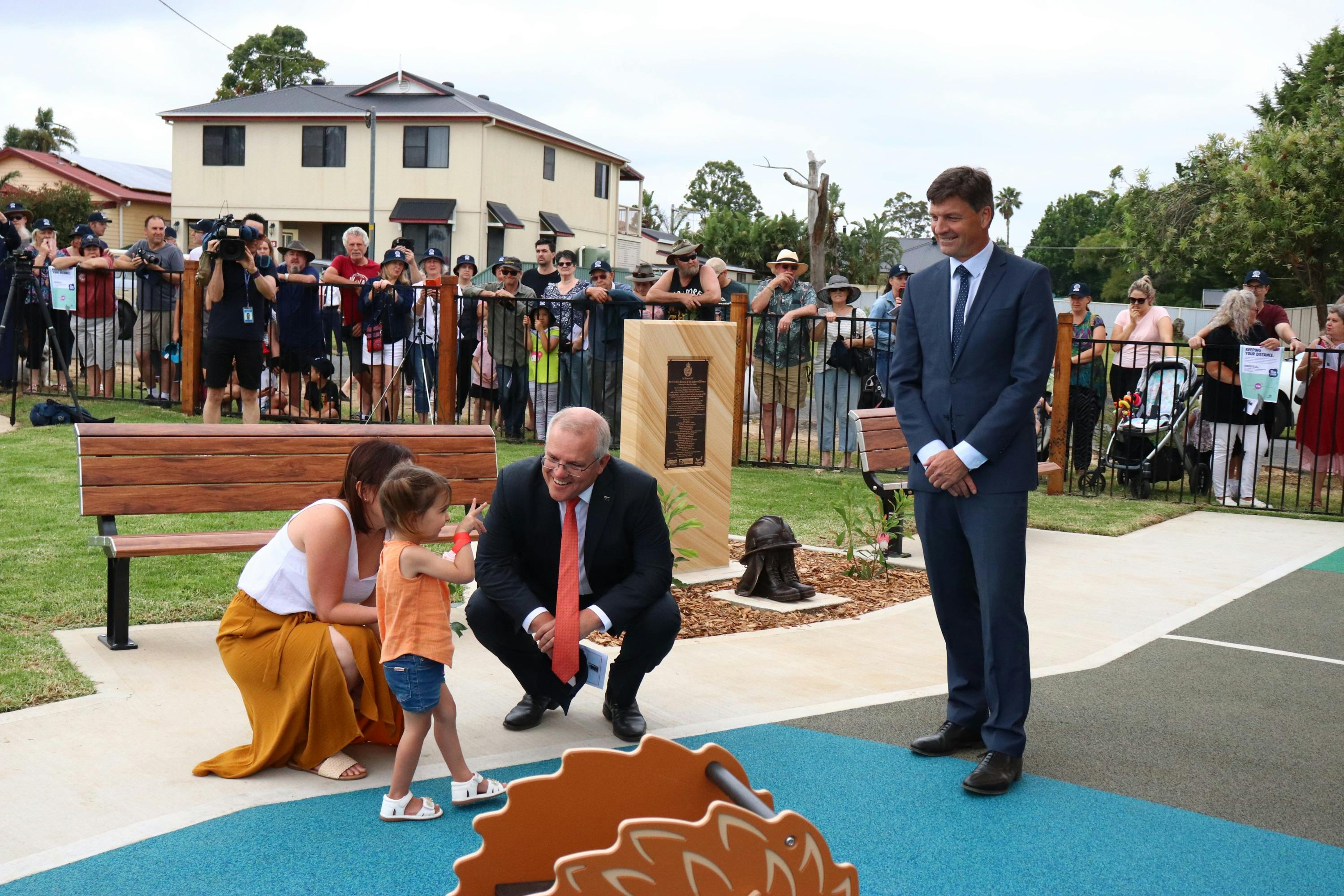 The Prime Minister with Charlotte, daughter of fallen firefighter Geoffrey Keaton at the playground, December 2020 