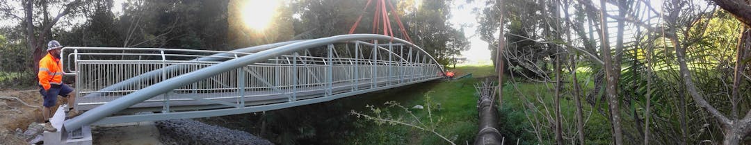The new bridge leading from Loaders Lane to the West Coffs District Park The new bridge is placed into position to link West Coffs District Park in William Sharp Drive with access to Loaders Lane to the east.