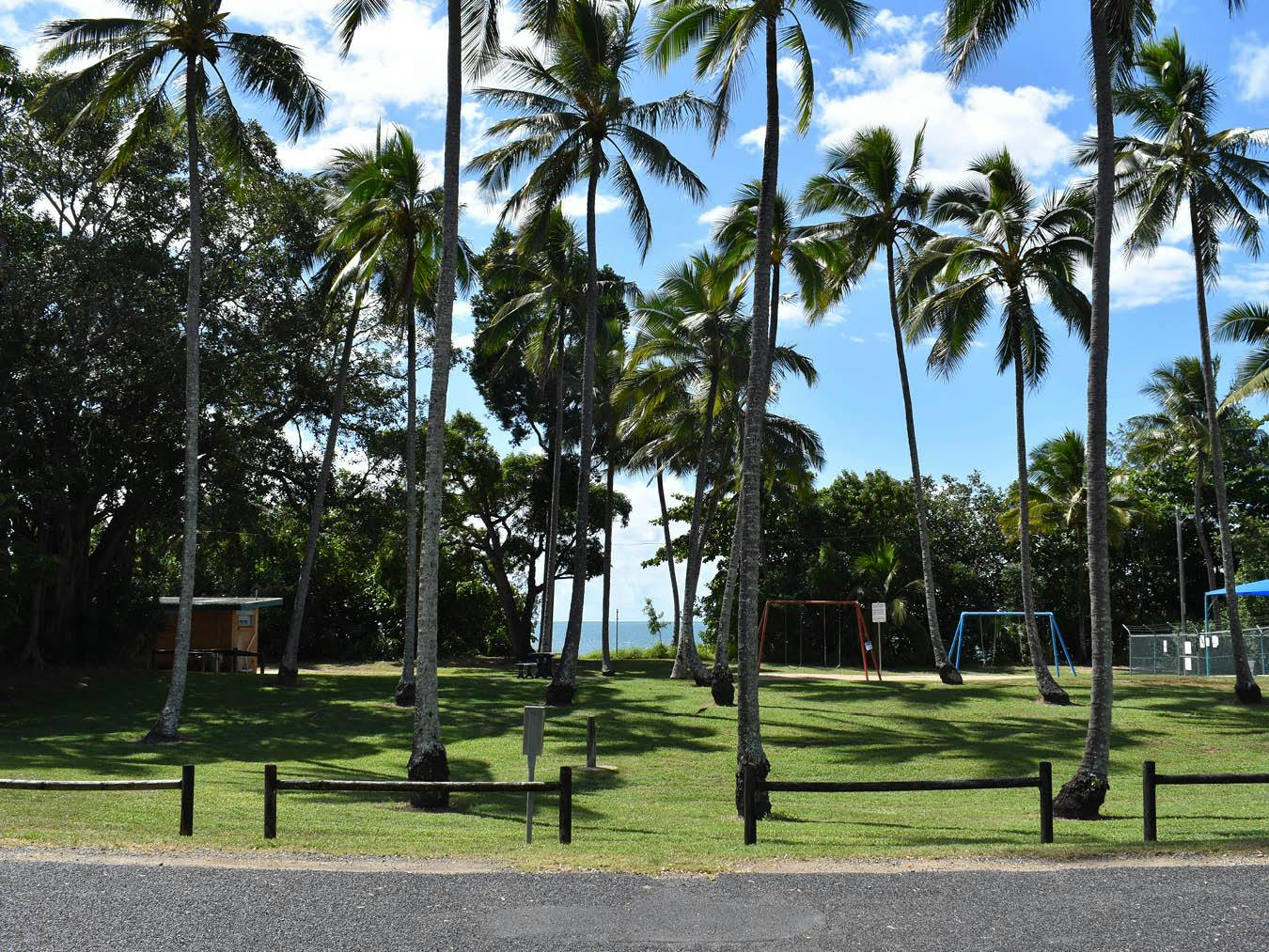 Intersection 3 - This photograph is looking north towards the beach. The wading pool and swings are visible on the right. The public toilet facilities are to the left.