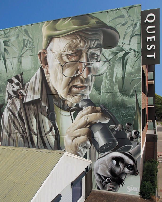 Mural by SMUG on wall of Quest