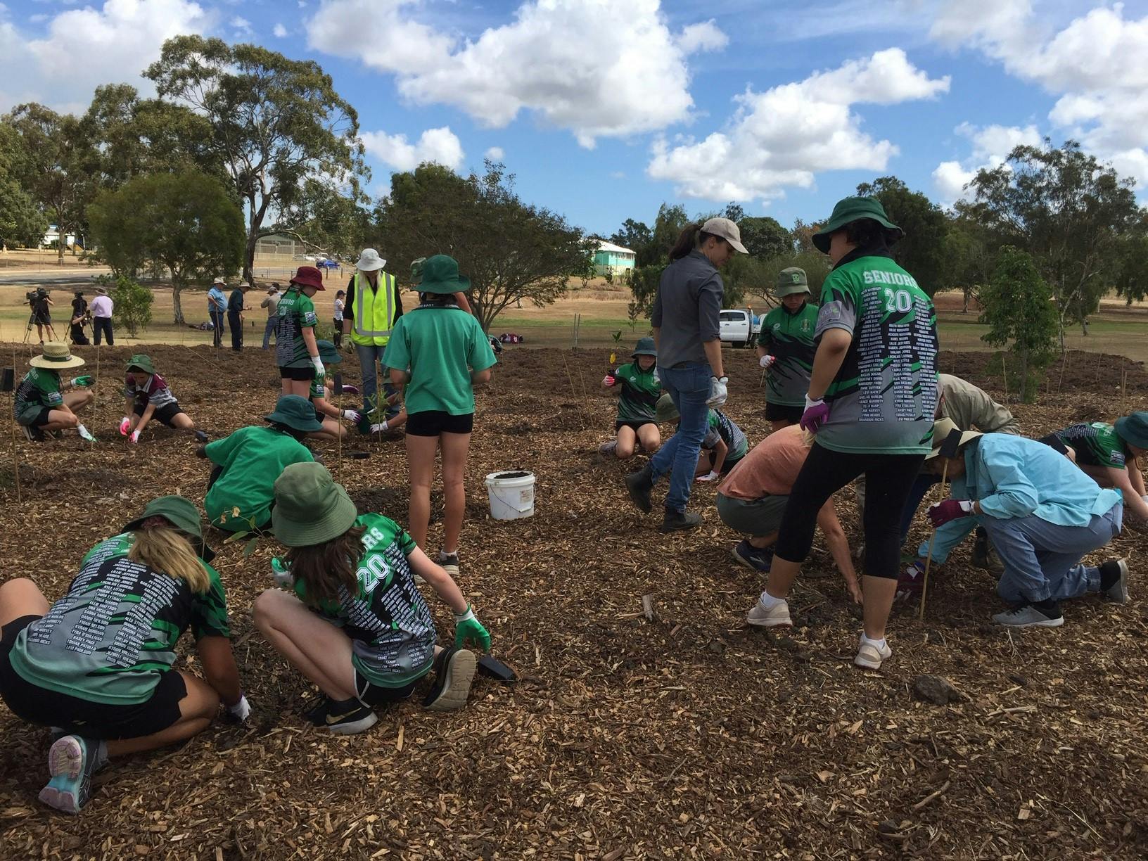 East State School students hard at work helping plant 500 trees.jpg