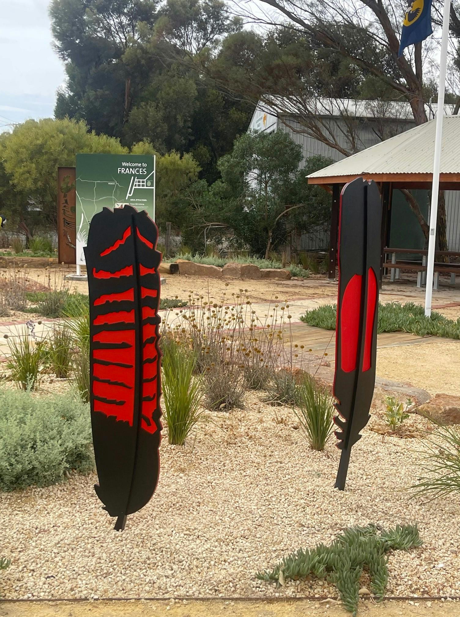 RED TAILED BLACK COCKATOO SCULPTURES - FRANCES TOWN SQUARE