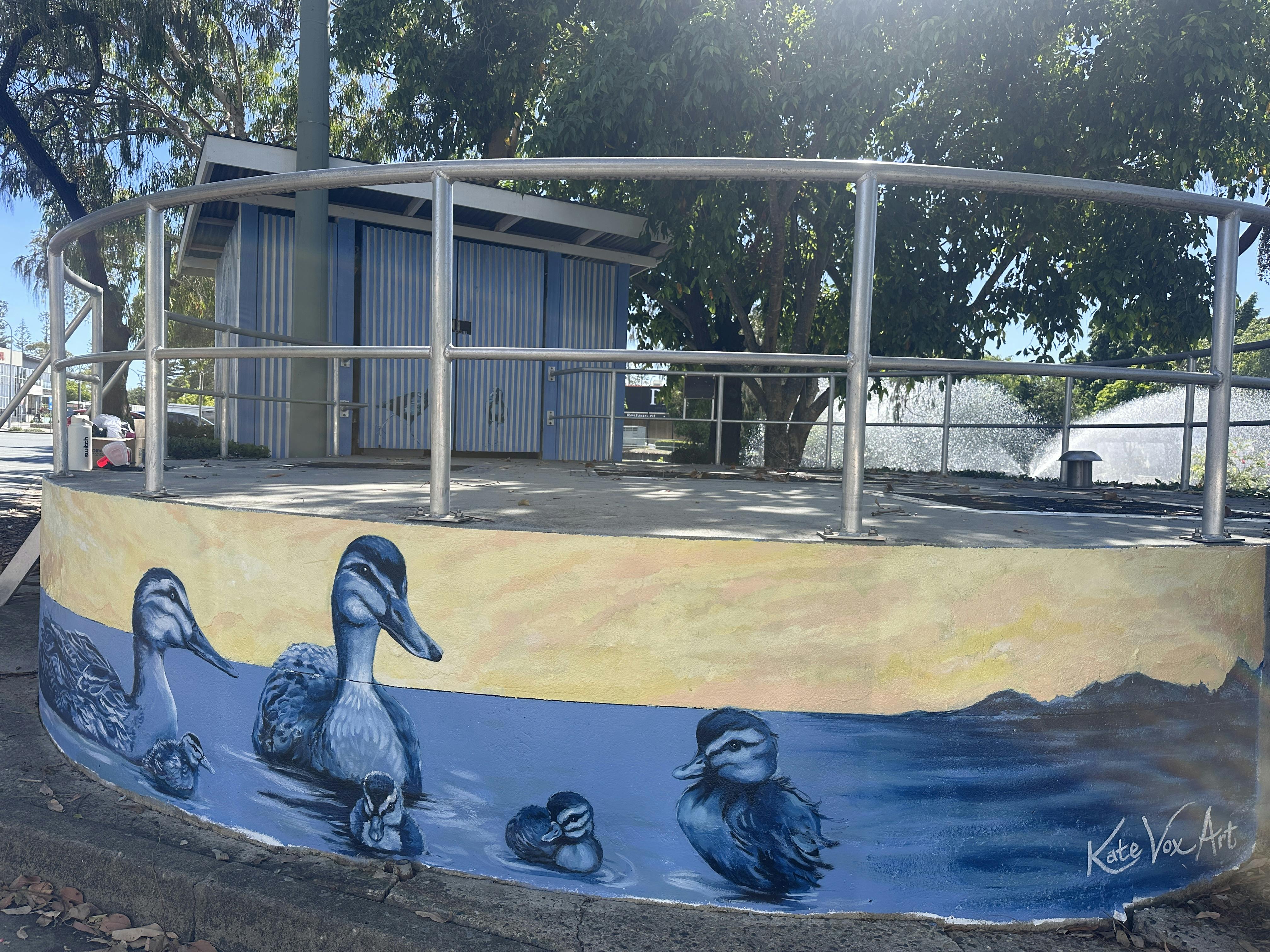 Ducks on the concrete tank