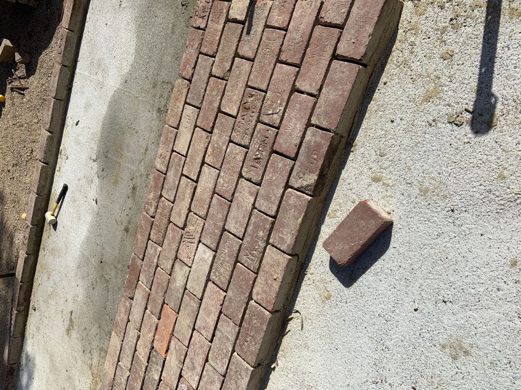Relaying bricks.jpg