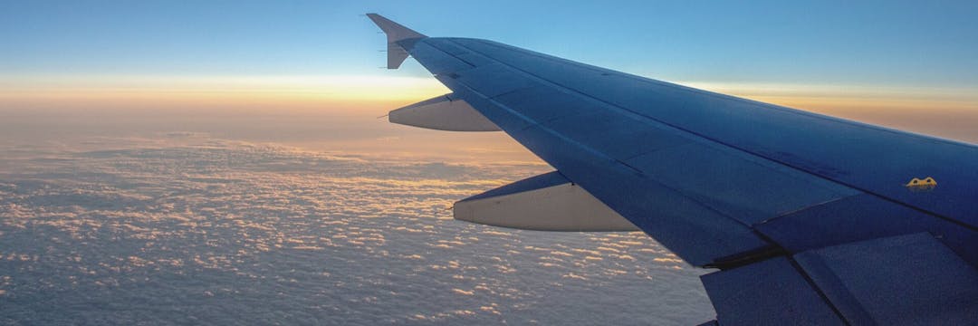 Plane over clouds