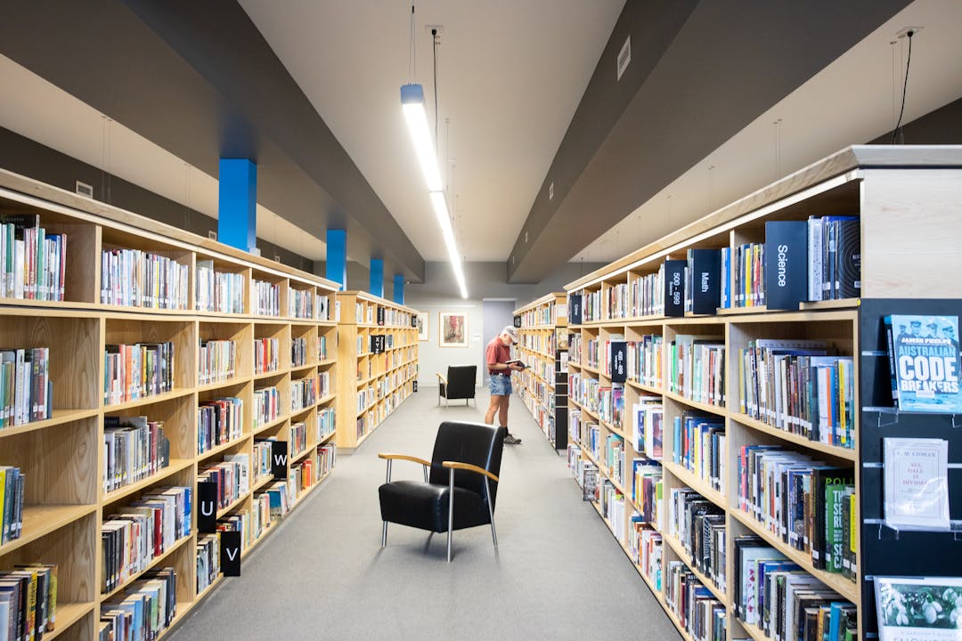 Wide shot of Armidale Library book cases