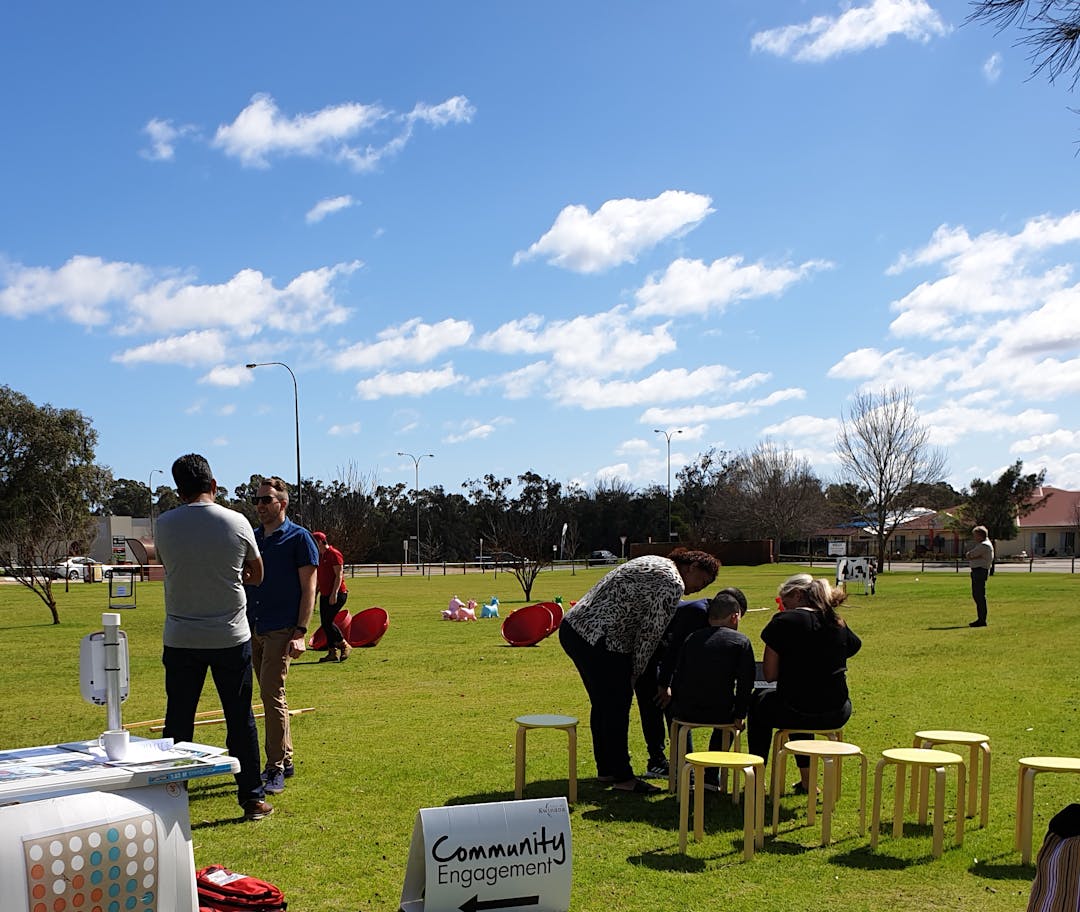 Photo of community engagement event with people in groups discussing Ascot Park, Bertram