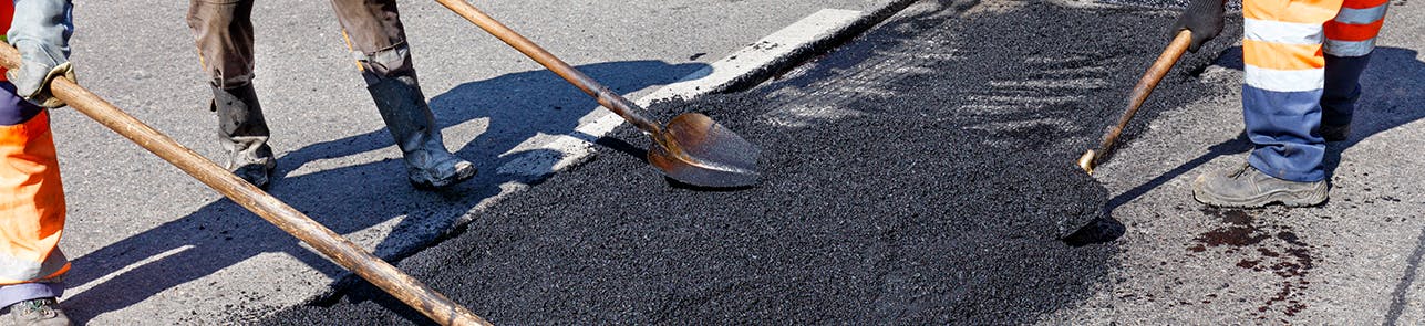 Road crews working on a road