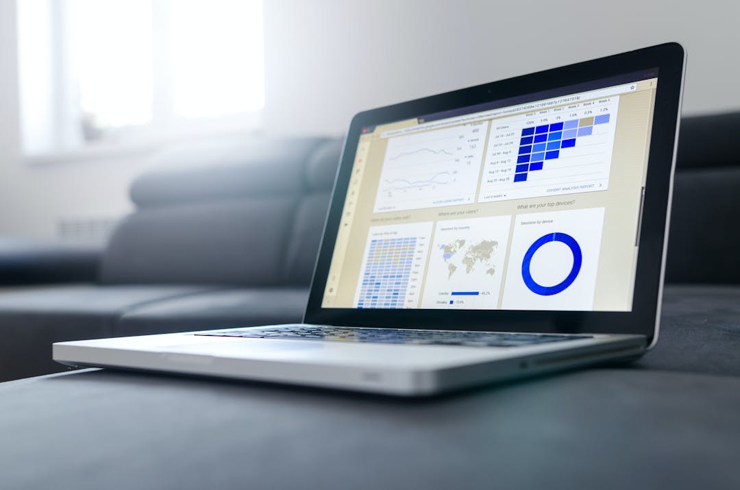 Laptop displaying financial forecasts