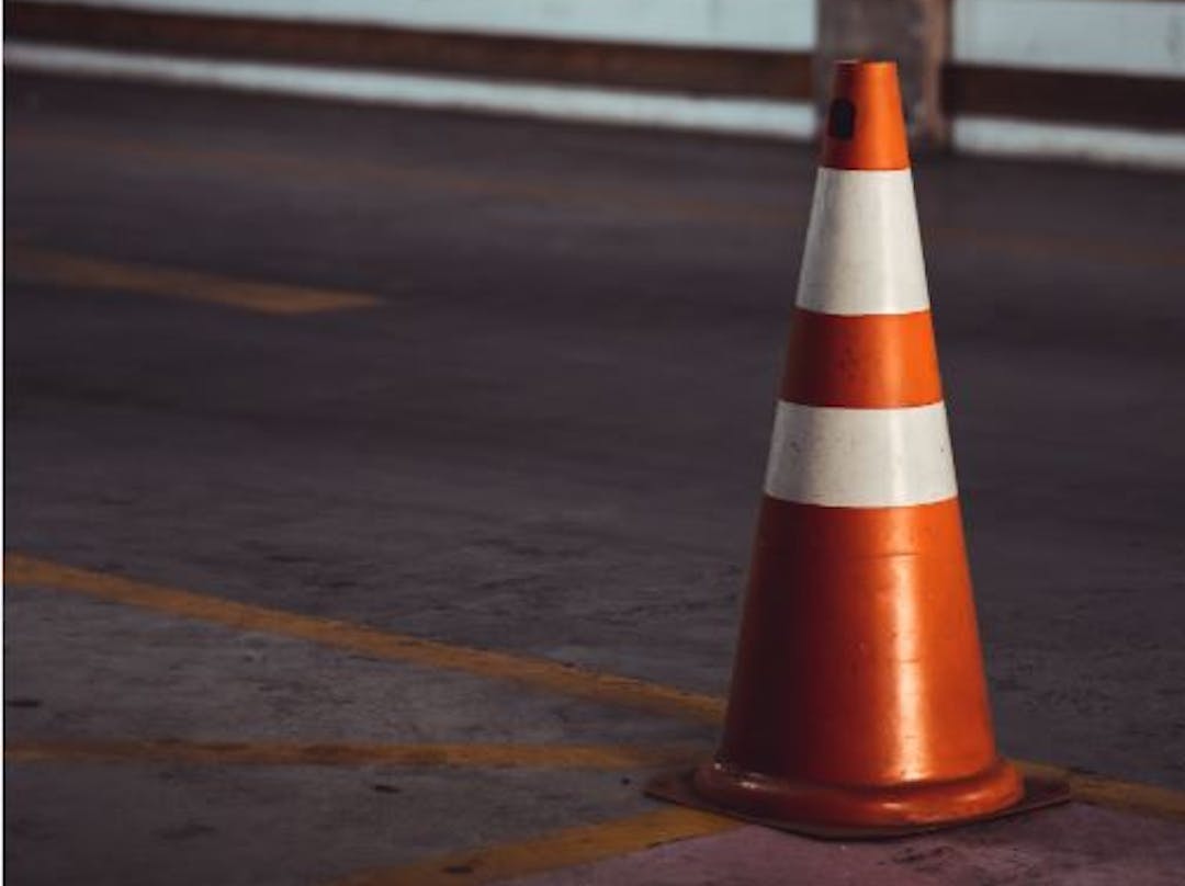 Traffic cone sitting on road