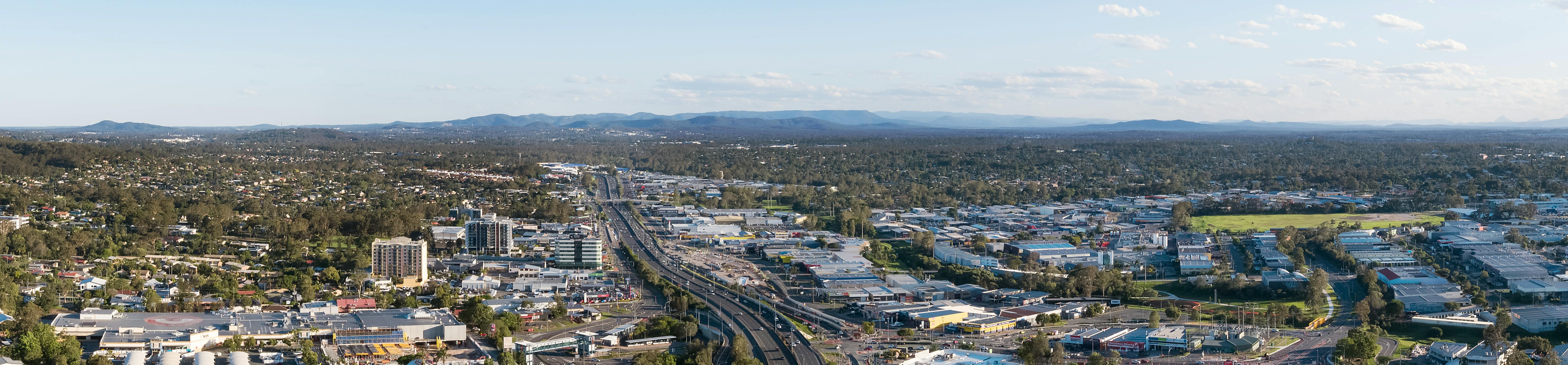 Aerial view of the City of Logan looking south from Springwood over the M1