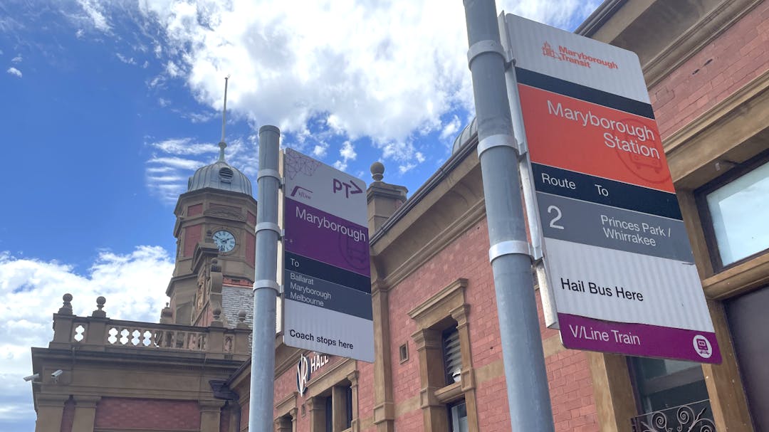 public transport signs at Maryborough rail station