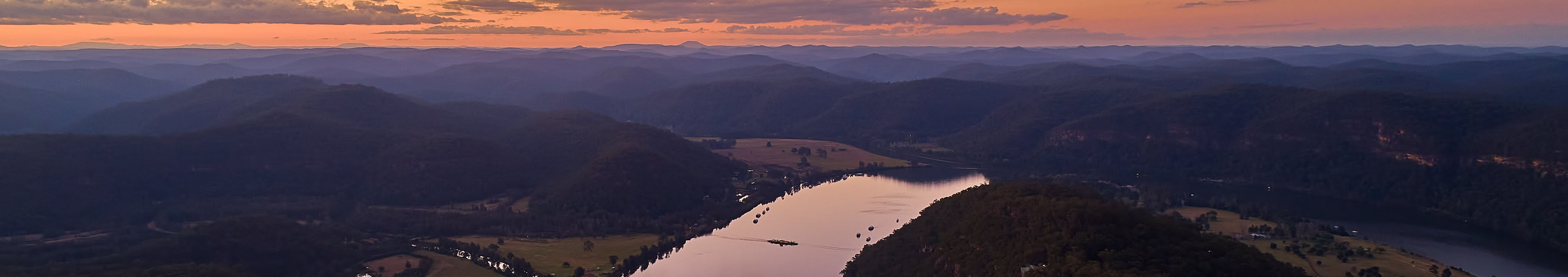 Drone shot of the Hawkesbury River at Wisemans Ferry during sunset