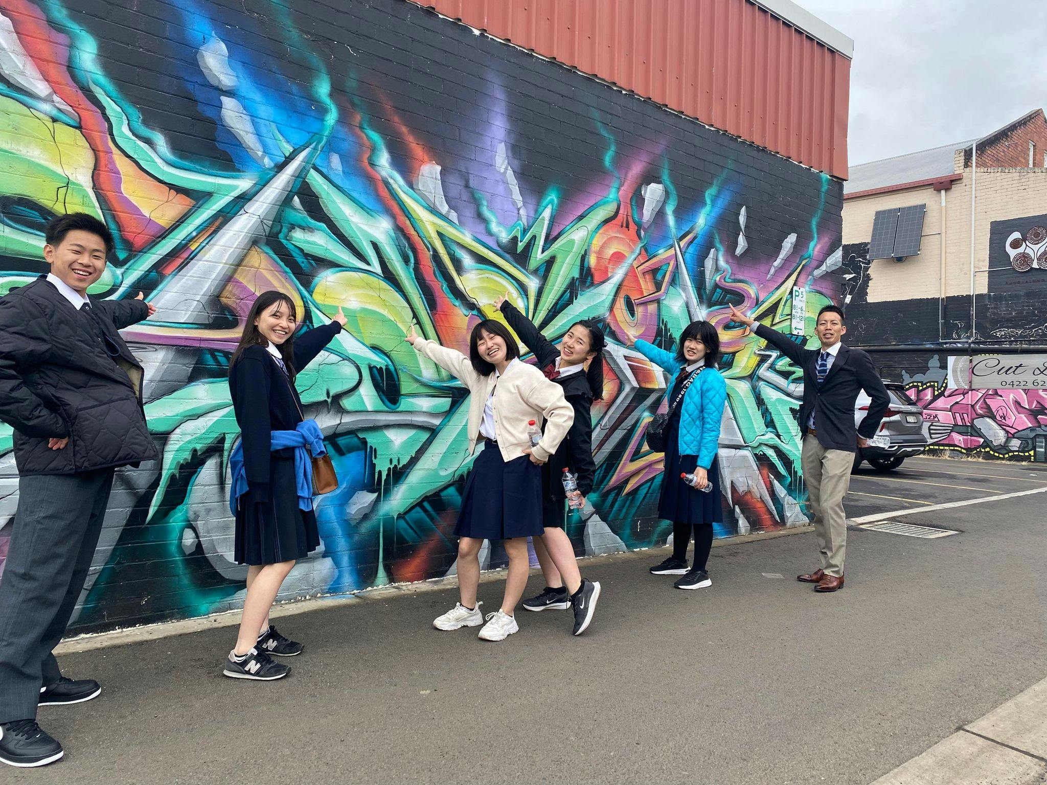 Yamato Takada Students check out the Back Alley Gallery