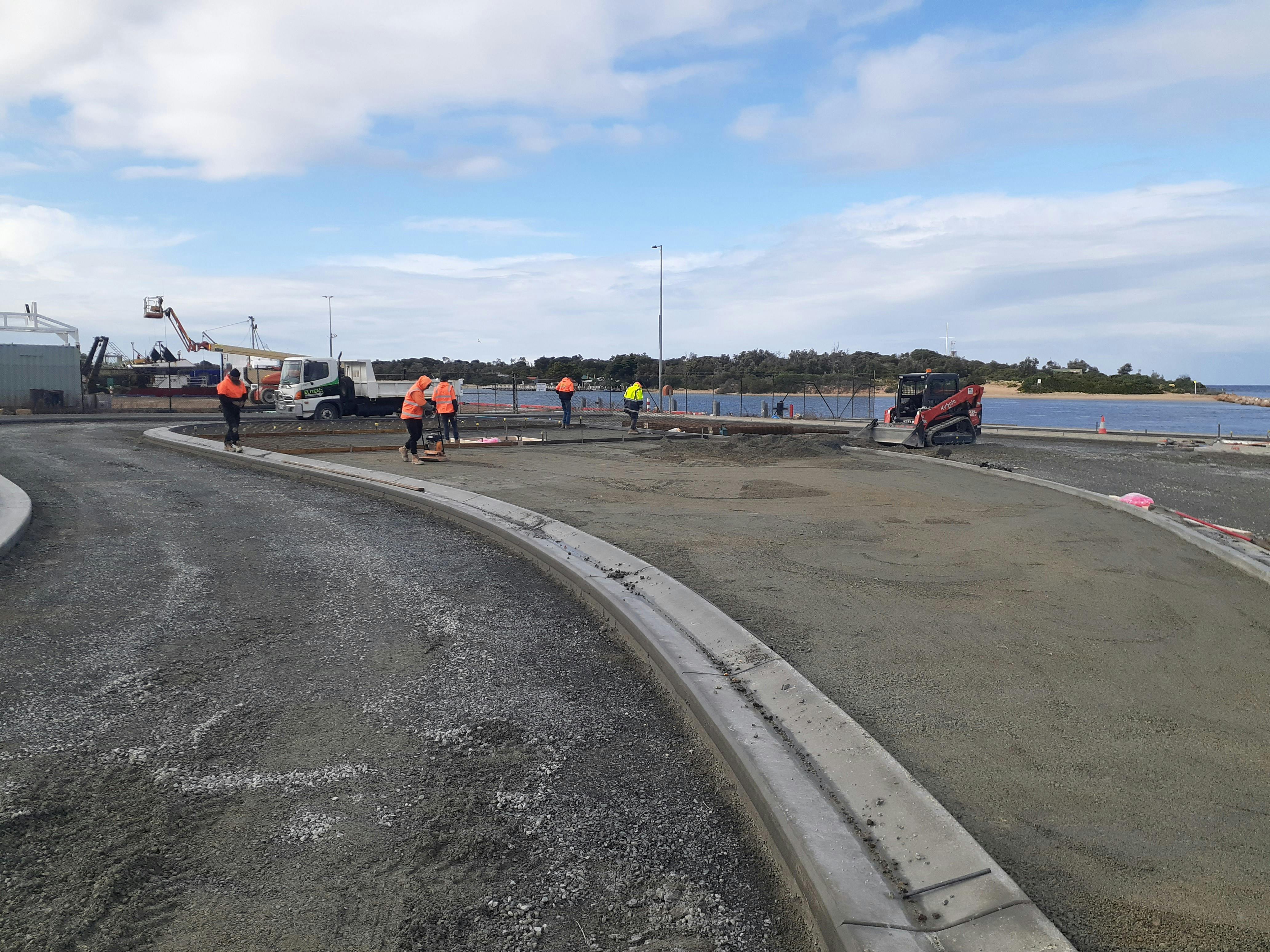 Preparing for decorative concrete being poured in traffic Island 