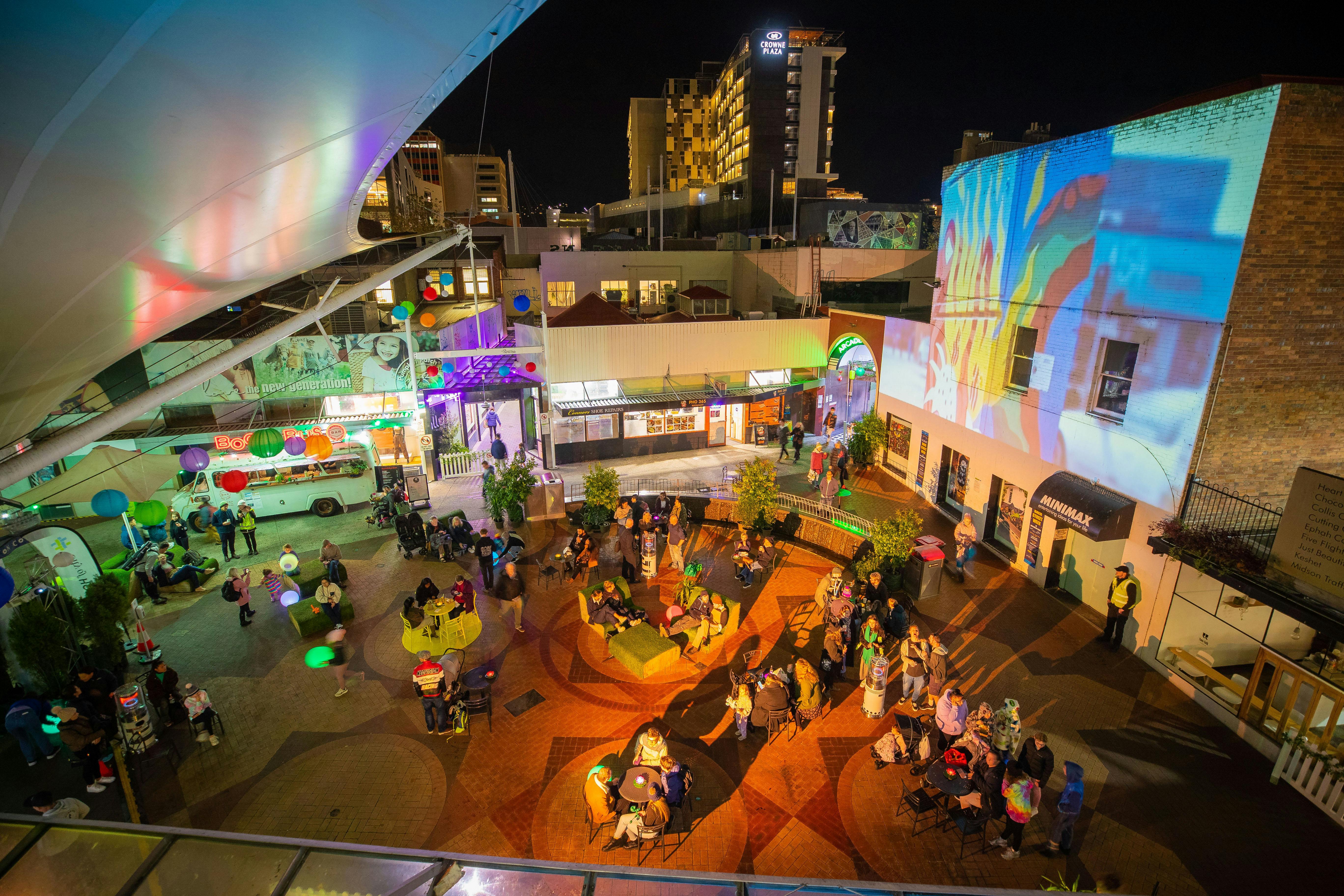Projections and people in public area