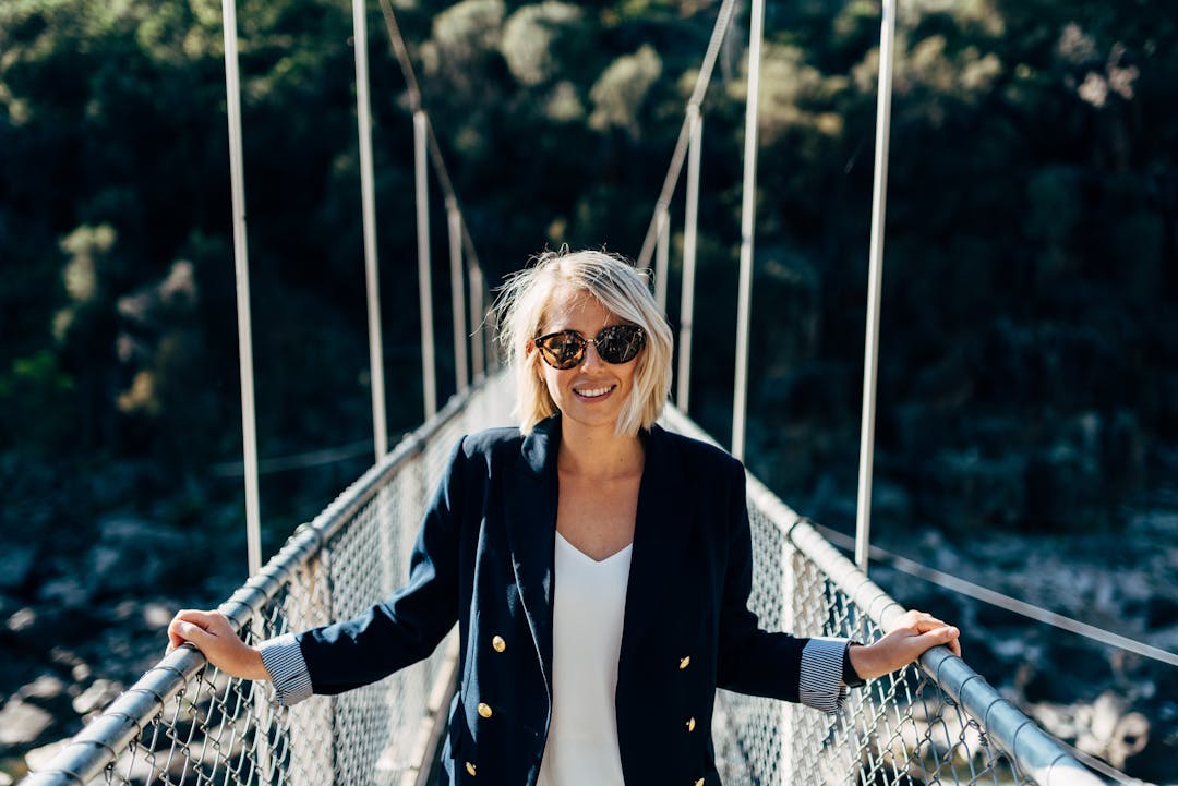 Lady smiling on the suspension bridge in the Cataract Gorge, Launceston