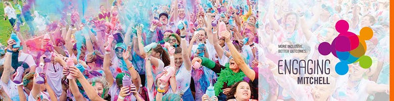 Competitors in the Colour Run with Engaging Mitchell Logo